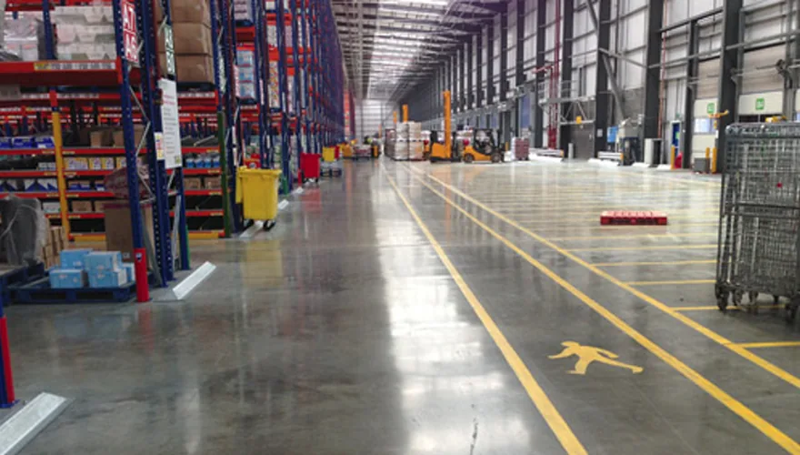 Epoxy-coated warehouse floor with safety markings