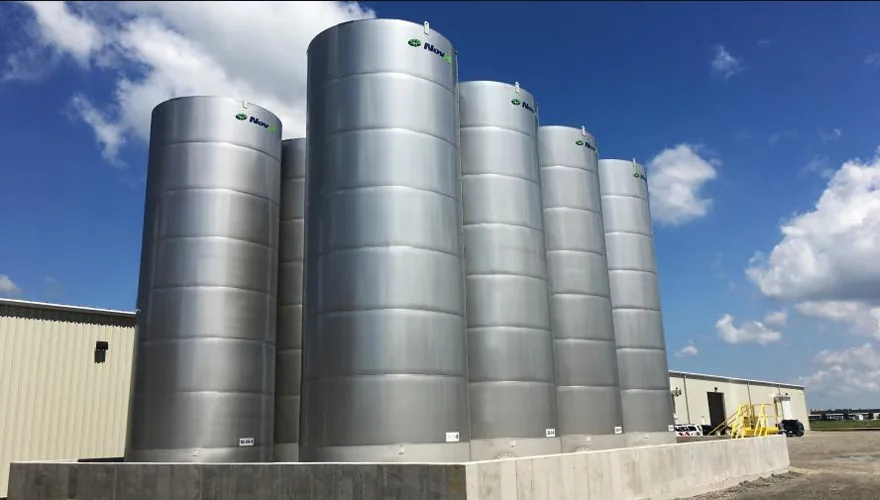 Row of coated storage tanks